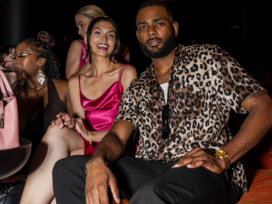 A couple enjoys exciting bottle service at Fulton Market nightclub.